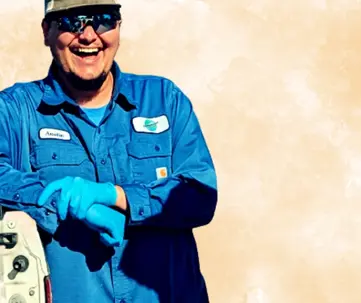 Environmental Pest Control's happy technician, Austin, ready to serve